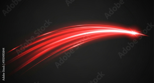 Abstract red light trails on black background.