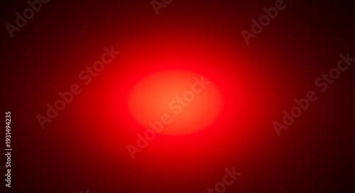 Bright Red Light Source Glowing in Darkness.