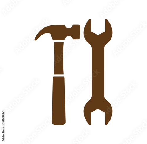 brown hammer and wrench tools on white background for repair and construction work
