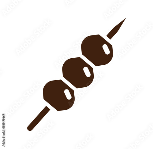 Brown meatballs on a skewer isolated on white background