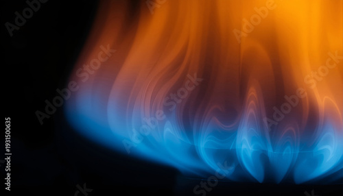 Blue and orange flames dancing against a dark background, showcasing the vibrant colors and fluid motion of fire in a close-up view
