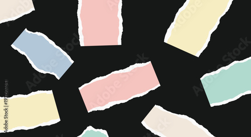 Colorful Torn Paper Fragments on Black.