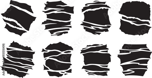 Collection of black torn paper shapes with white lines