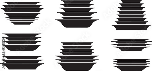 Stacks of black plates and bowls on white background