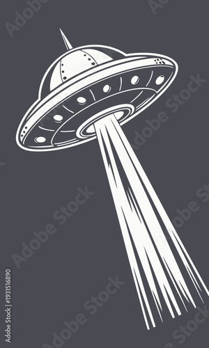 UFO flying saucer with bright light beam.