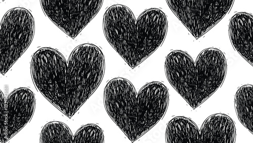 Seamless pattern of bold black hand drawn scribbled hearts on a white background creates a textured and romantic wallpaper for designs.