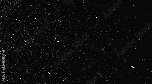 A stunning starry night sky with numerous small white stars scattered across a black background