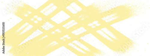 Abstract yellow spray paint background with intersecting diagonal lines and subtle speckles