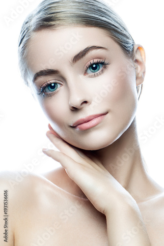 beauty model girl with clean skin and natural nude make-up. Skincare facial treatment concept