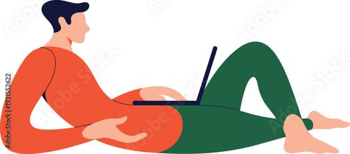 Person in orange shirt lying on green surface using a laptop green pants