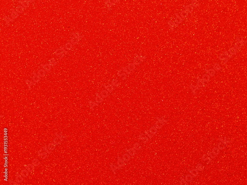 Macro shot of vibrant red metallic car paint texture