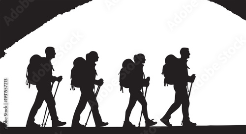 Silhouette of martial artist kicking on a hill with radiant sunburst background