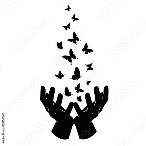 A pair of hands releasing a flock of butterflies into the air