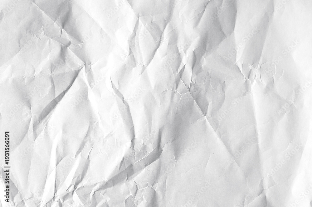 Fototapeta premium Crumpled white blank sheet as texture or background, long picture of folded paper, top view