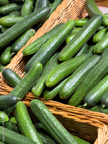 A basket of green cucumbers