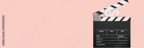 clapper board and easter bunny ears, cinema ticket sale, movie discount, spectator excitement,film studio, motion picture, Hollywood production