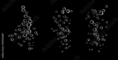 Fotografija Air bubbles rising underwater isolated on black background, oxygen flow in clear water, abstract aquatic texture, sparkling bubble stream, carbonation effect, high contrast studio shot