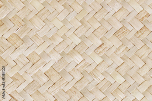 Pattern of old reed weaving mat with vintage style for background and design art work.