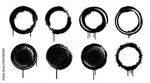 A set of eight black ink splatter circles on white background isolated on white background