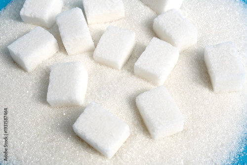 Εκτύπωση καμβά There are a lot of lump sugar on a blue background.
