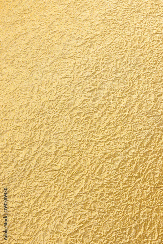 金色の揉み和紙の質感がある和風背景テクスチャ素材　Golden momigami washi paper texture and Japanese style background