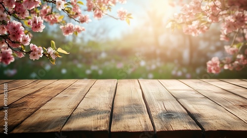 Cherry Blossoms Bloom Over a Wooden Table in a Sunny Garden During Springtime