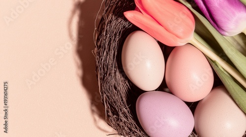 Colorful Eggs and Tulips in a Nest on a Soft Background for Spring Celebration