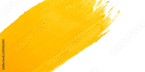 A macro closeup of a yellow paint brush and sponge reveals a fresh, abstract texture with a natural color reminiscent of a raw lemon or healthy pasta isolated on white