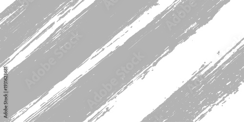 Abstract black and white grunge background featuring a weathered cement wall texture with a vintage dirty paint pattern on an old gray stone surface