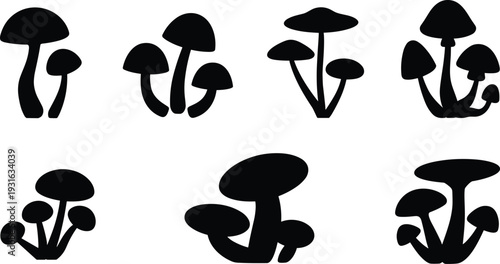 Stylized mushroom cluster silhouettes in diverse shapes and sizes, botanical black illustration collection for fungi, forest, and nature design