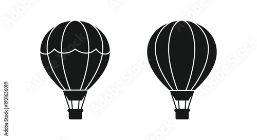 Two black hot air balloons against a white background