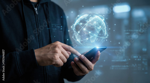 Wallpaper Mural Anonymous hacker using a smartphone for global network security breach and digital data theft. Torontodigital.ca