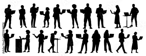 Black silhouettes of diverse business people in various poses, interacting with laptops. Flat vector illustrations isolated on transparent background.