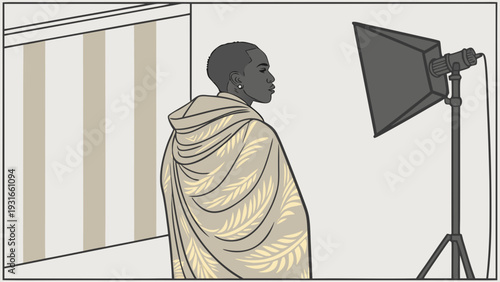 Young man in traditional attire posing for a professional photoshoot in a studio setting.