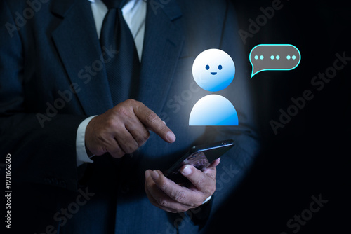 Human using smartphone typing Live chat chatting and social network concepts. chatting conversation in chat box icons pop up on application
