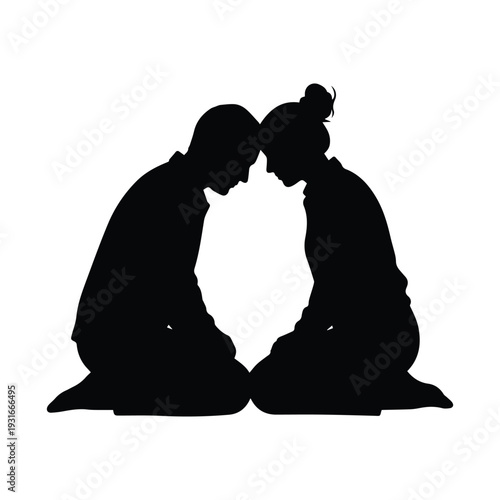 Loving couple in intimate embrace with heads touching