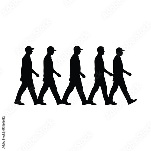 Silhouettes of five people walking in a line with caps on