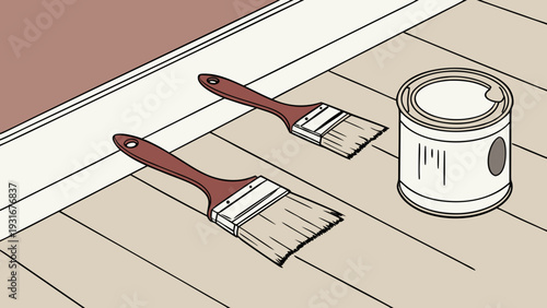 Paintbrushes and paint can on wooden floor ready for home renovation.