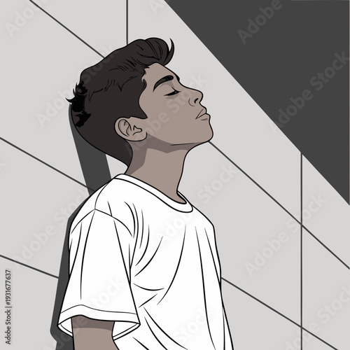 Young man with eyes closed enjoying the sun.