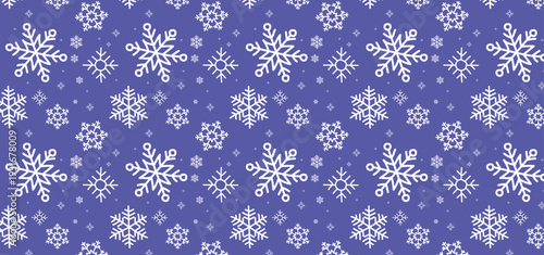 Seamless white snowflake pattern on blue background for winter seasonal textile and festive wallpaper design