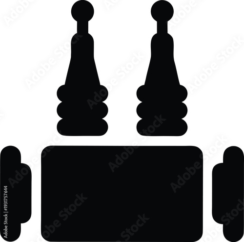 Two black chess rooks and a rectangular chessboard piece on white background