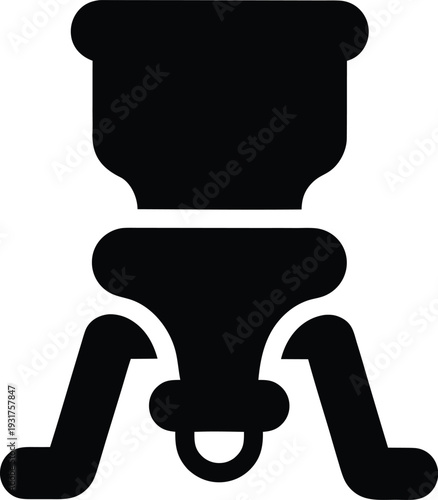 Black and white of a person sitting on a toilet with legs spread apart