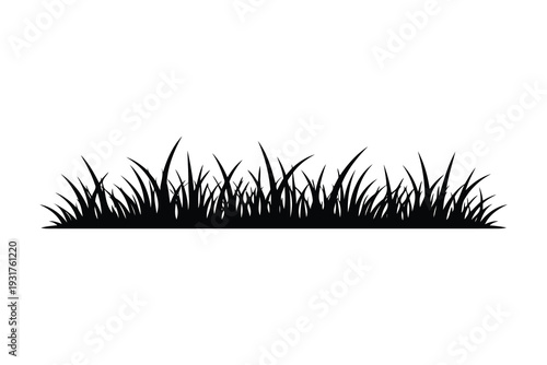 A minimalist black and white illustration of a grassy patch with short blades.
