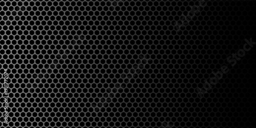 Black perforated metal plate. Metal grill. Black metal texture steel background. Perforated sheet metal.Abstract dark gray circle mesh pattern background texture.