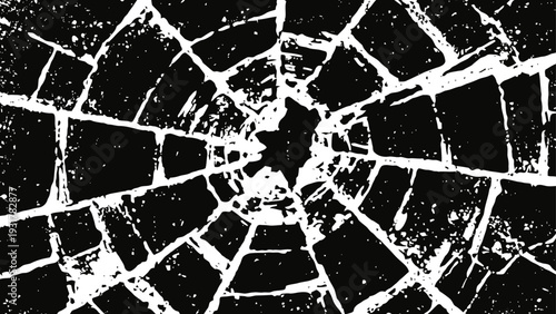Broken glass texture with shattered cracks radiating from the center