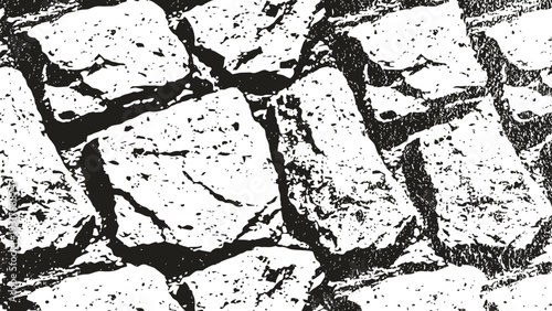 Close up of rough stone wall texture with irregular shaped rocks and visible cracks