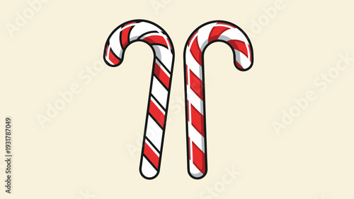 Pair of traditional red and white striped Christmas candy canes isolated on a light cream colored background for holiday.