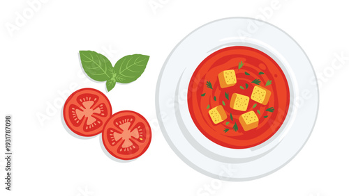 Delicious bowl of creamy tomato soup topped with croutons served with fresh tomato slices and basil leaves.