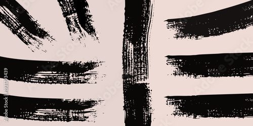 Abstract brushstrokes in black on a pale pink background