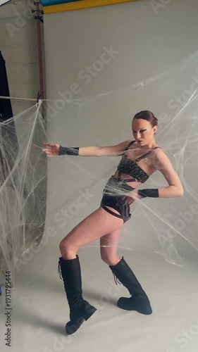 Fashion Model Posing in Spiderweb Studio Shoot